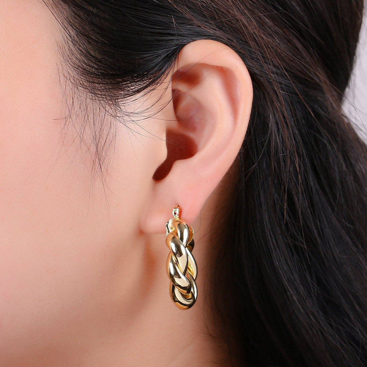 $245 | Gold Twisted Hoop Earrings