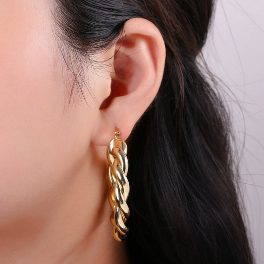 $245 | Gold Twisted Hoop Earrings